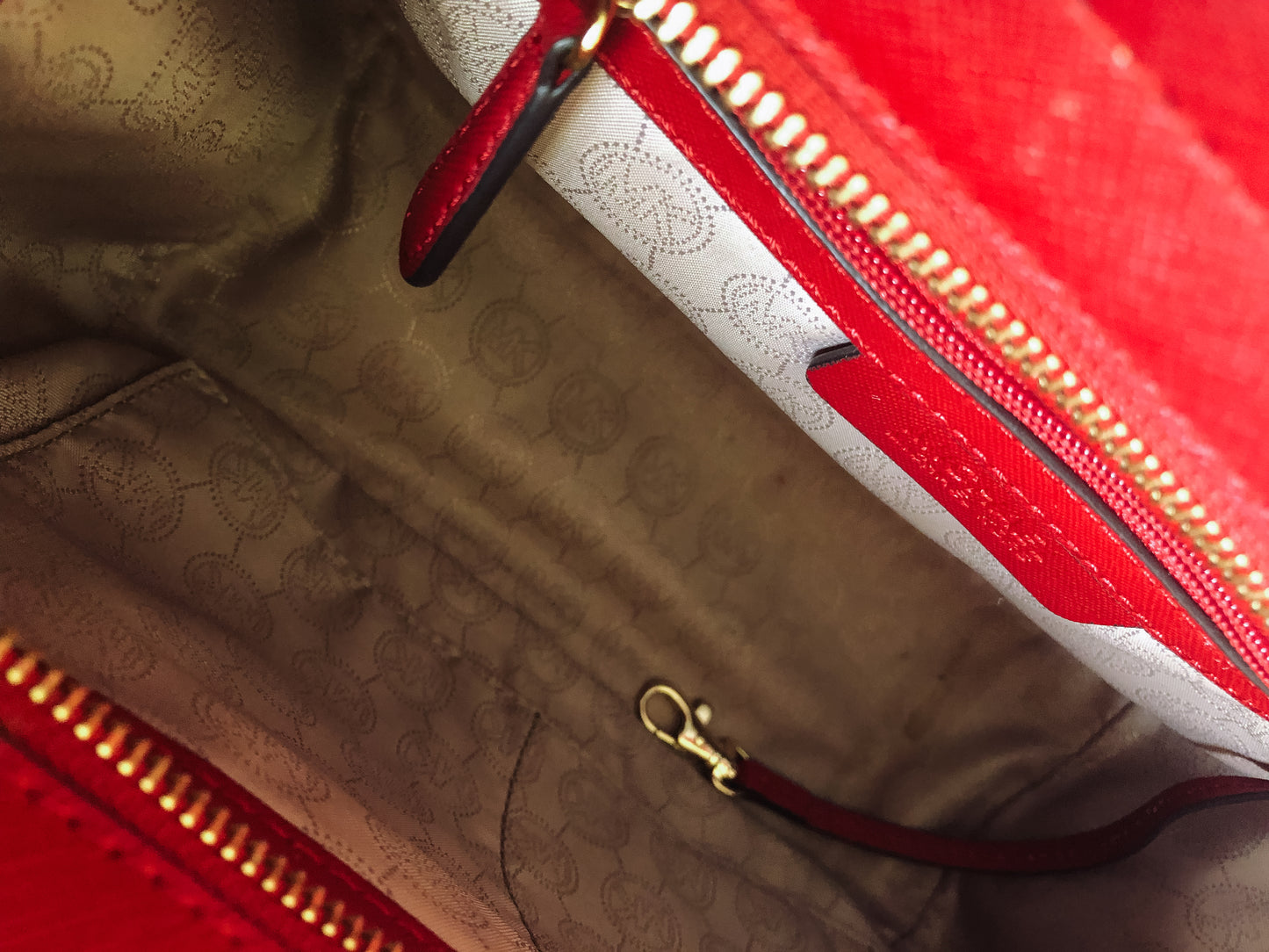 Red Michael Kors handbag