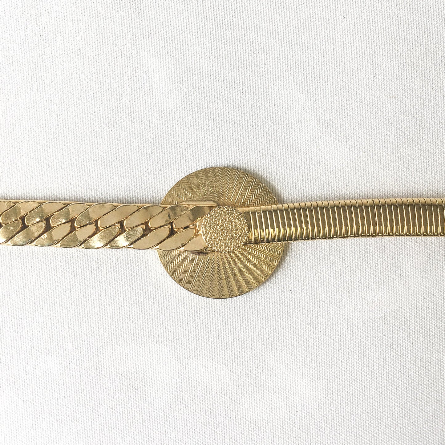 Vintage Gold Toned Metal Expandable Belt with Grecian Archer Detail