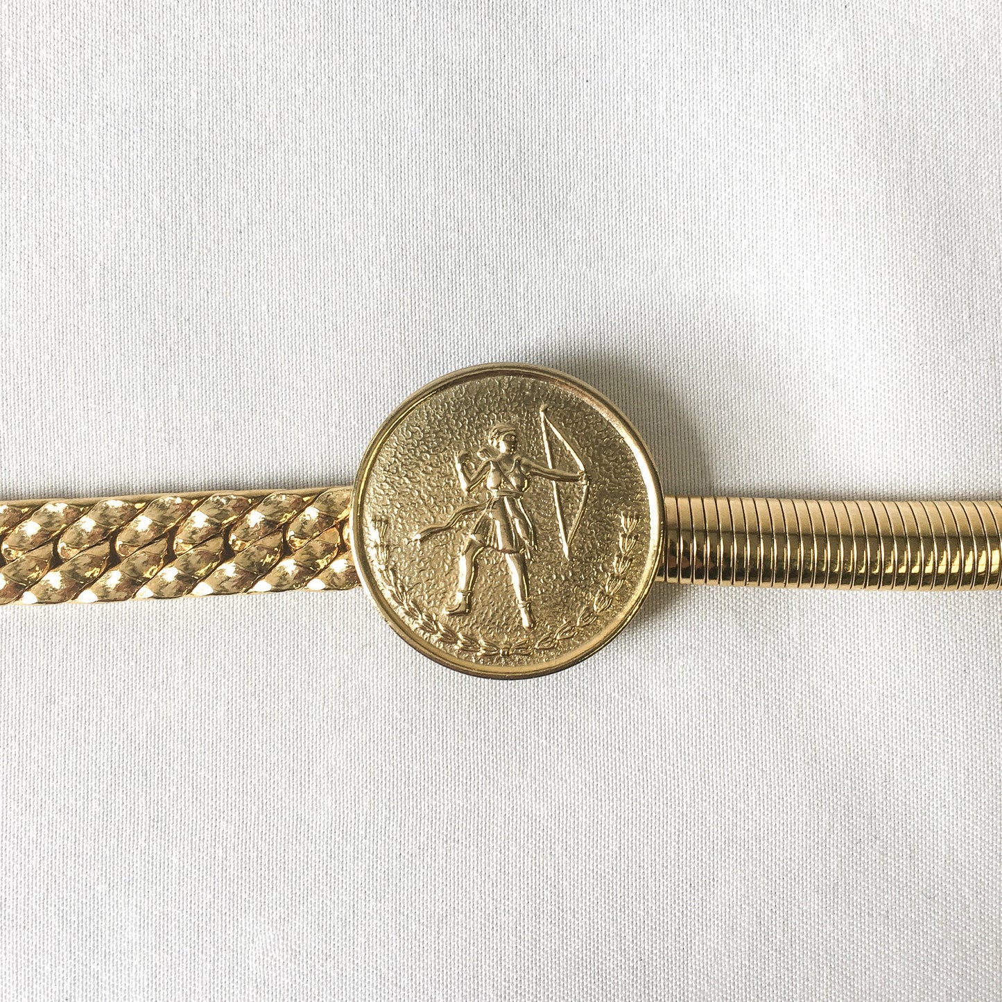 Vintage Gold Toned Metal Expandable Belt with Grecian Archer Detail