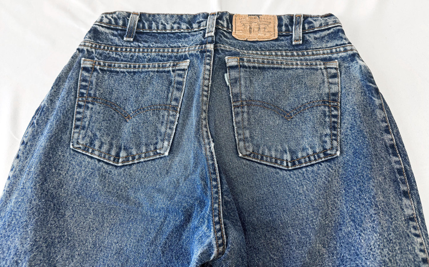 Vintage 90s Levi's Medium Acid Wash High Rise Cinched Tapered Mom Jeans, 30" x 30"