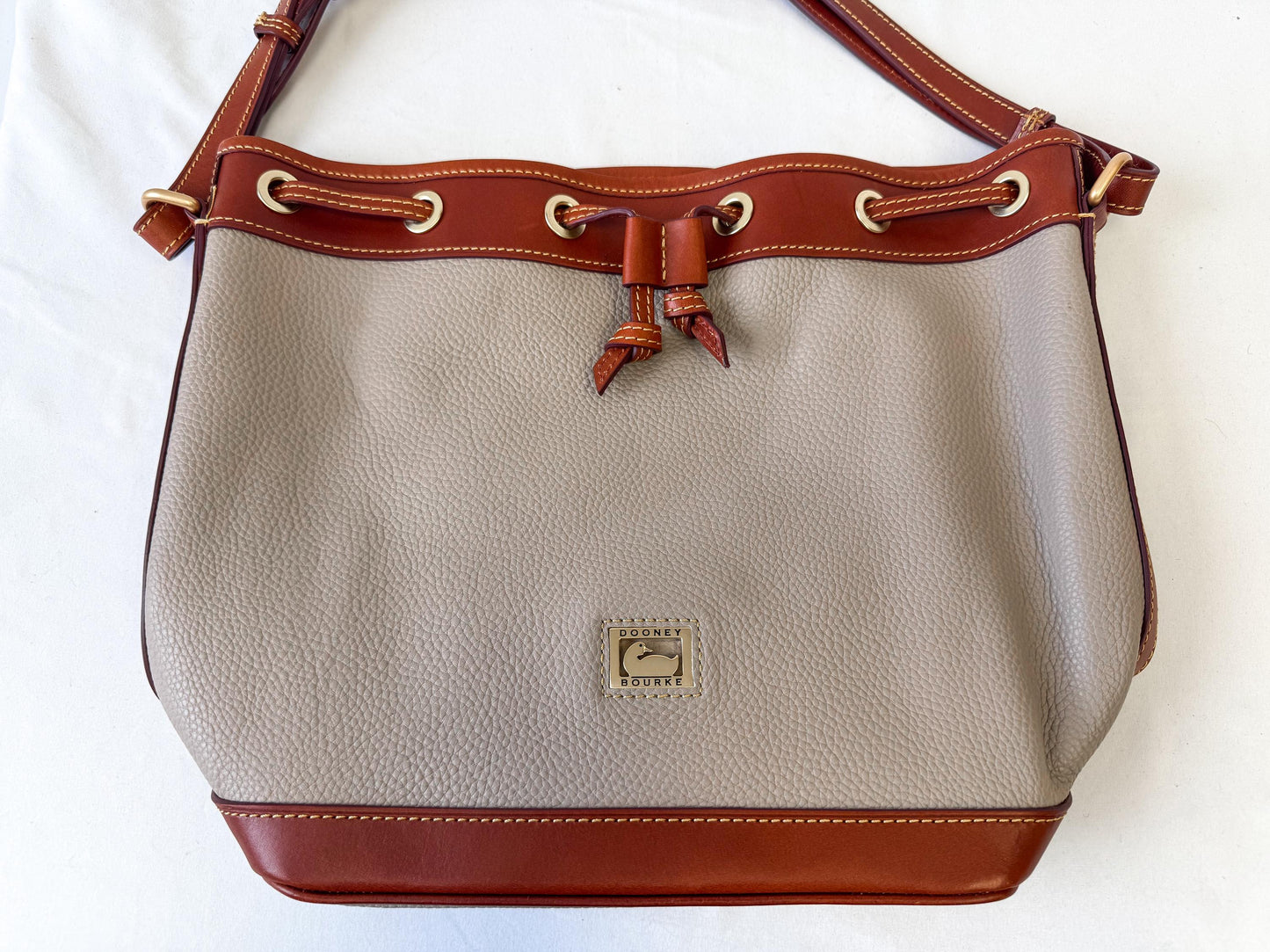 Modern Dooney and Bourke Dillen Elephant Gray Taupe Leather Drawstring Bucket Shoulder Bag