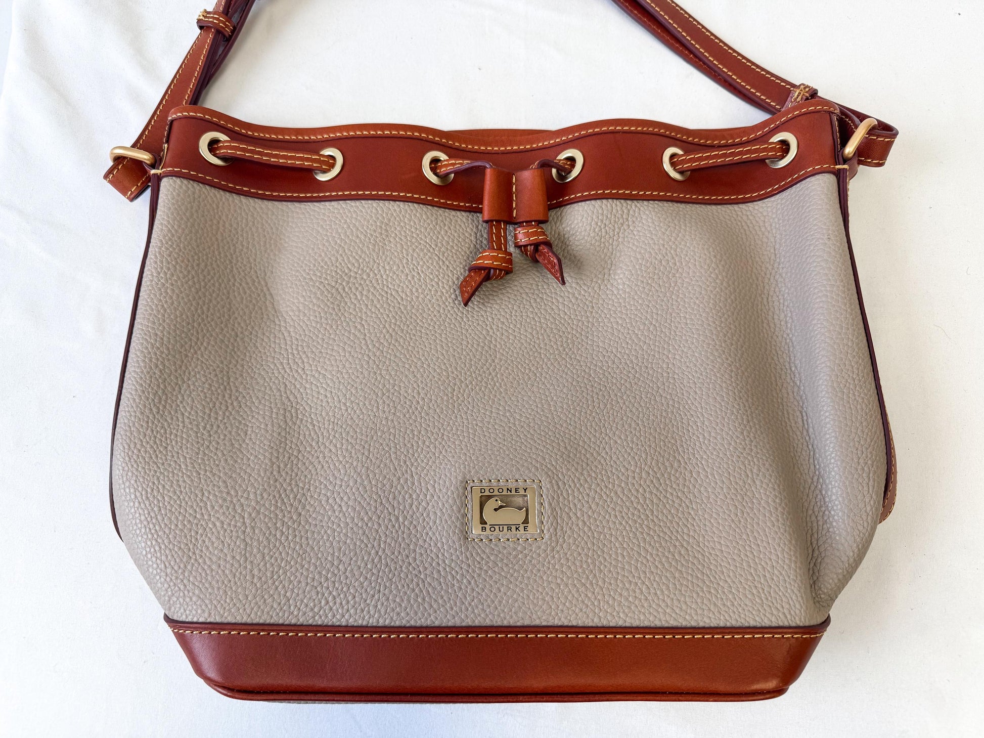Modern Dooney and Bourke Dillen Elephant Gray Taupe Leather Drawstring Bucket Shoulder Bag